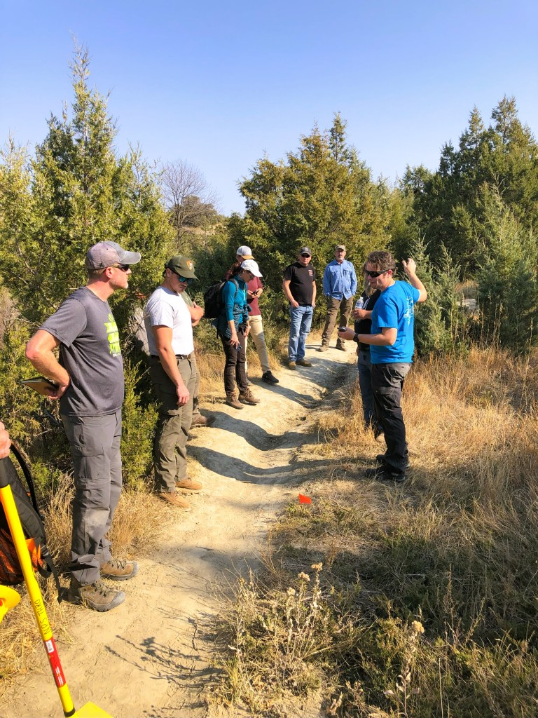 Class participants present their maintenance plan during trail assessment training.